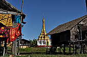 Inle Lake Myanmar. All the buildings are constructed on piles. Residents travel around by canoe, but there are also bamboo walkways and bridges over the canals, monasteries and stupas. 